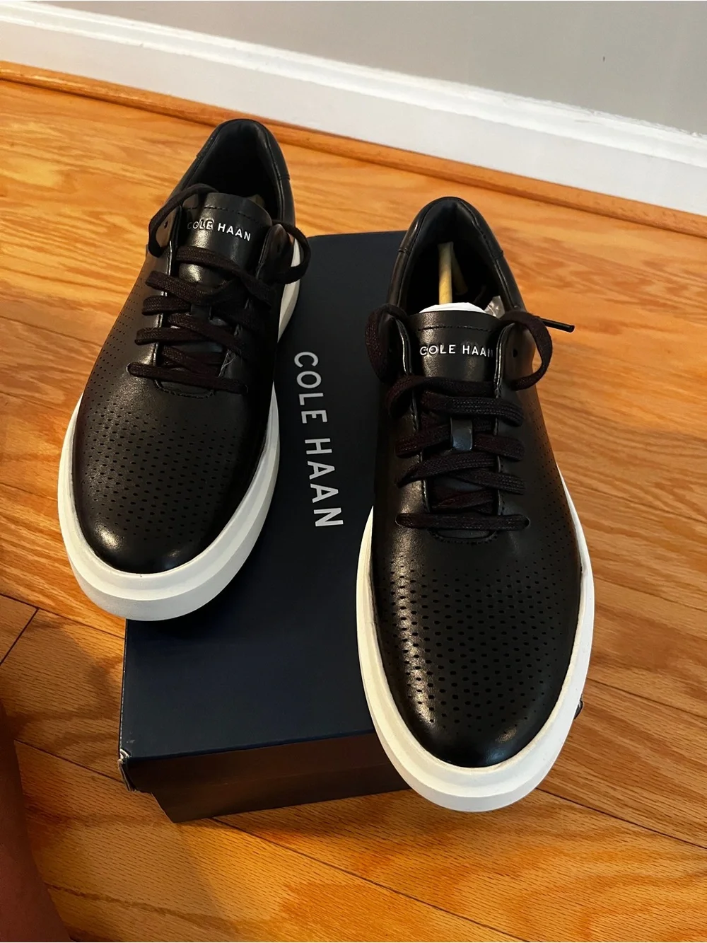 Cole Haan Black Leather Perforated Low-Top Sneakers with White Sole